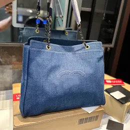 42 см роскошной джинсовой джинсовой ткани с большой емкостью сумки для вышивки винтажной сумки подмышка с регулируемой цепной сумочка синяя тренд -дюймо
