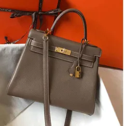 2024 7a bolsa de alta qualidade mulheres bolsa designer sacolas artesanais bolsas de luxo clássico moda togo carteira de couro sac de luxo femme movimento atual 655ess