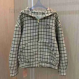 Kvinnorjackor Designer 2024 Early Spring Letter Wool Spliced ​​Sticked Thickened Hooded dragkedja Plaid PLAG FÖR MÄNNER OCH KVINNER CZTY