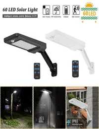 60 LED Solar Light PIR Motion Sensor IP65 Outdoor Garden Wall Dimmable Lamp Solar Lamp Remote Controller Manual7154432