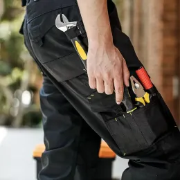 Spodnie robocze spodnie Mężczyźni budownictwo z odblaskowymi paskami Spodnie Cargo Pockets Spodnie Liczba Praca Praca Bezpieczeństwo Spodnie dla mężczyzn