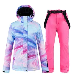 高品質のレディーススキースーツ冬の屋外スノーーツ風力発電防水ジャケットとパンツスノーボードジャケットカラフルな衣類9469185