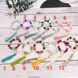 Silicone bead handmade elastic rope bracelet keychain PU leather tassel pendant multi color optional