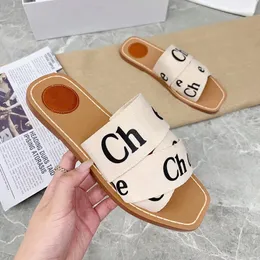 Designer Sandálias Woody para Mulheres Mules Planas Slides Luz Tan Bege Branco Preto Rosa Iace Lettering Em Relevo Chinelos de Lona Sandália Mulheres Verão Sapatos Ao Ar Livre