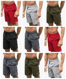 Shorts de fitness muscular verão casual esportes correndo men039s meia calças treinamento basquete sólido casual secagem rápida estiramento ba8850541