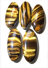 Pietre burattate di palma Occhi di tigre Cristallo di quarzo Curativo Pietra preziosa a forma di sapone liscio5059301