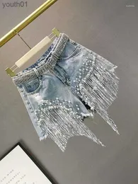 Kvinnors jeans jeans vår denim shorts europeisk hög midja smal botten rippade pärlor fransade breda ben korta byxor 240304