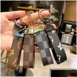 Chaveiros Lanyards Luxo Homens Fivela Couro PU Chaveiro Presente de Negócios Chaveiro Mulheres Carro Cinta Cintura Carteira Chaveiros Drop Delive Dhkaa