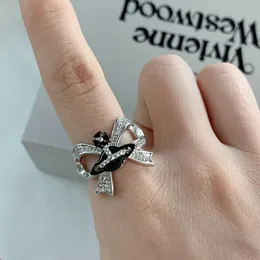 Designer vivienewestwoods ring nisch designkänsla saturn kejsarinnan dowager stjärna ring kvinnlig mode söt cool kryddig tjej öppning pekfinger ring ljus lyx