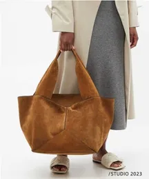 Versatile Simple designer bag Large Capacity Unique Design handbag Suede Bucket Bag Neutral Style Tote Bag 240131
