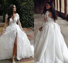 Fantastici abiti da sposa arabi in tulle di pizzo Dubai Una linea maniche lunghe Collo trasparente Appliques Perline Abiti da sposa lunghi con spacco sul davanti Robe de mariage personalizzate BC18324_