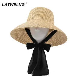 Wide Brim Hats Bucket Hats New womens wide Brim sun hat with Rabbing UV protective straw hat large-sized beach hat wholesale of summer fisherman hat J240305