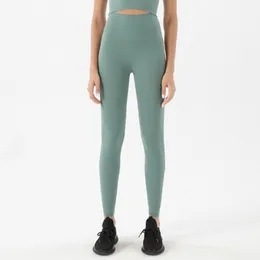 Kadınların Yüksek Belli ve Kalçaları Garip Çizgiler Olmadan Kaldırılmış Tozluklar 9 Noktalı Sport Yoga Pantolon
