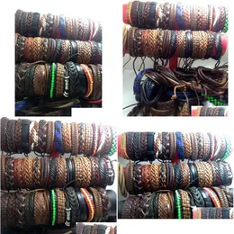 Cazibe bilezik toptan 100pcs erkek kadınlar vintage gerçek deri sörf manşet bileklik parti hediye karışık stil moda mücevher çok otkol