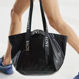 Borse da sera Borsa da donna 2024 Borsa a mano di grande capacità Cartelle alla moda Shopping con nastro e borsa con lettere