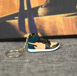 Stereo Saf 3D El Sanatları Mini Sneaker Anahtarlık Kadın Erkek Çocuklar Anahtar Yüzük Hediyesi Lüks Ayakkabı Anahtarlıkları Araba Çanta Anahtar Basketbol Ayakkabıları Anahtar Tutucu 10 Stil E23