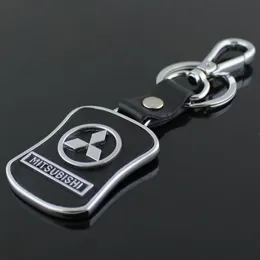 5pcs Lot Top Fashion Car Logo -keychain لـ Mitsubishi Metal Leather Keyring سلسلة مفاتيح حلقة Llaveros Chaveiro Emblem Holder289O