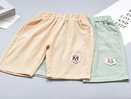 Verão Boys039 shorts macacão kids039s algodão Capris calças bonitas para estudantes do ensino fundamental e médio casua8289537