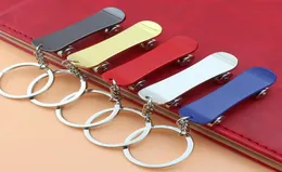 DHL Metal Key Chain Scooter Toys Toys Skatboarder039S Portable Finger Skateboard Toy Christmas 2762420