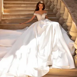 Luxuriöses Brautkleid in A-Linie aus Satin mit Illusionsausschnitt und kurzen Ärmeln, Perlenapplikationen, Spitze, Brautkleider mit Knopf hinten, kann individuell angepasst werden