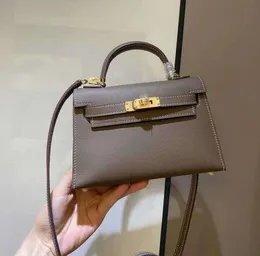 Luxurys bayan tasarımcılar çanta çanta çantalar omuz crossbody messenger inek derisi gerçek gerçek deri moda büyük tote tam tahıl litchi debriyaj çanta 66