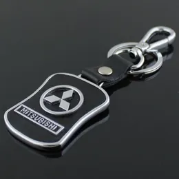 5pcs Lot Top Fashion Car Logo Cheakkain لـ Mitsubishi Metal Leather Keyring سلسلة مفاتيح Llaveros Chaveiro Emblem Holder264H