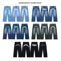 EuroPeamerican Brand Jeans Män kvinnor Ins Explosion Models Brand Casual Denim Pants Street Personlighet Design Tryck Jeans 240219