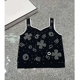 Gilet in maglia da donna estivo 2024 con tracolla firmata con paillettes Top alla moda nuove donne gilet bianco nero