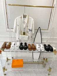 Gigi 50 sandaler giulia sandaler söta sandal lyxdesigner läder kvinnor glider sommar platt mode strand tofflor hög klack utomhusskor