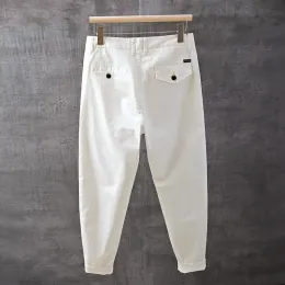 Spodnie mężczyźni odzież 2023 Nowe jesień lato białe worka dla mężczyzn białe, swobodne spodnie homme senior sens świeże proste dziewięć punktów spodnie koreańskie