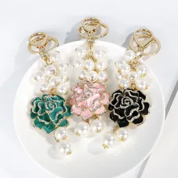 La nuova moda alla moda nel designer di lusso grazioso fiore di camelia multi perle borsa con nappa charms portachiavi per donne ragazze343z