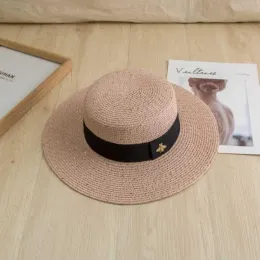 Bi breda randen hattar för kvinnor Straw Hat Ladies Bow Summer Outing Sunscreen Sunshade European och American Retro Leisure Mittade strandhattar