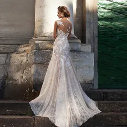 Splendidi abiti da sposa 2024 Maniche ad aletta con applicazioni trasparenti in pizzo con perline e fascia Sweep Train Abiti da sposa con perline Abiti da sposa