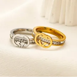 تصميم جديد للذهب الفضة مطلي بالرسالة الزواج مصمم العلامة التجارية المجوهرات الكريستال الخاتم