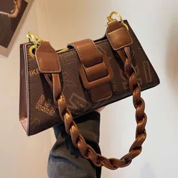 Bolsa feminina de última geração, sensação pequena, verão 2024, novo modelo moderno e com design de nicho, bolsa de ombro único nas axilas, bolsa crossbody versátil