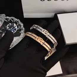 Designer pulseira bangle charme pulseira pulseiras de luxo mulheres carta jóias banhado aço inoxidável 18k ouro pulseira manguito moda festa acessórios 240308