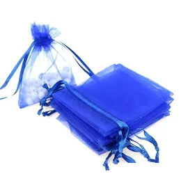 Torebki biżuterii, torby s 100pcs królewskie niebieskie dstring organza prezentowe pakowanie biżuterii torebki 7x9cm 9x12cm 10x15cm przyjęcie weselne