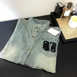 Camicia a camicetta ampia con ricamo floreale in spugna di jeans denim dal nuovo design primaverile da donna