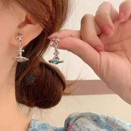 Viviennes Westwood Earrings Saturn Earrings West透明ガラスボールクロスイヤリング