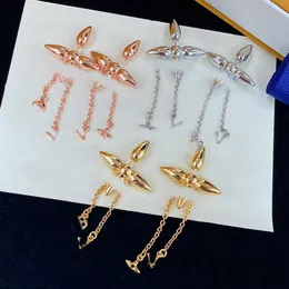 Luksusowa koniczyka Tassel Gold Silver Stude Stud Kropek kolczyka projektantka Marka stali nierdzewnej moda dla kobiet akcesoria biżuterii hurtowe z pudełkiem Wysoka jakość