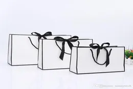 Design criativo grande borda preta saco de papel kraft branco com alça festa de casamento favor bowknot saco de presente de papel lx014802640424
