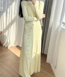 Chunyuan 24 early spring San ro's slanted button knit long sleeved skirt