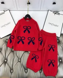 Inverno crianças meninas suéteres conjuntos moda arco bebê lã quente tricô camisola com calças agasalho crianças roupas vermelhas 24396442557