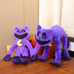 Atacado criaturas sorridentes assustadoras boneca de gato roxo sorrindo animal monstro brinquedo de pelúcia de gato roxo