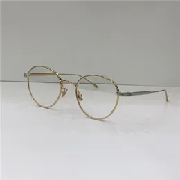 Novo designer de moda óculos ópticos 0009 metal redondo quadro retro estilo moderno lente transparente pode ser prescrição clear lens234l