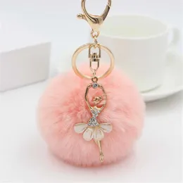 Keychains Rhinestone Dancing Girl Keychain med stor Pompom Charm Söt plyschkedja för kvinnors bilväska Holder Accessories