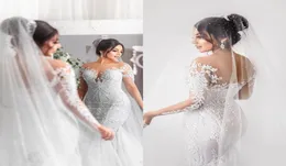 2020 Long Sleeve Mermaid Wedding Dresses Bridal Gowns Sheer Jewel Neck Lace Appriqued Buttons Back Robe de Mariee Arabic Wedding D9572343