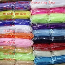 100pcslot 24 Färg 20x30 25x35 30x40 35x50cm Organza DrawString Påsar påsar smycken Presentförpackning 240309