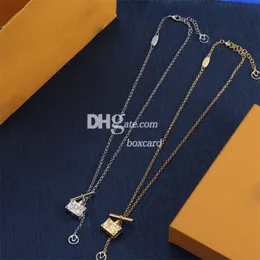 Lyxig guldkedja halsband väska formade hänge halsband kvinnor chic brev halsband med låda för daglig outfit