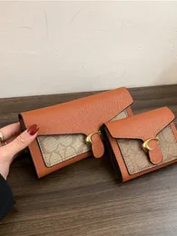 Designer Wallet ID -kortmynt Purses Cowhide Leather Fashion Key Pouch Mens Card Holders Zippy Purses Chain Money Wallets Keychain